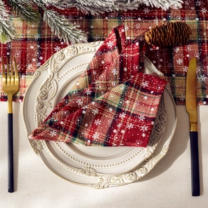 Christmas table runner and napkin set with red plaid snowflake pattern and festive decor