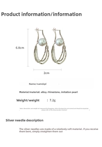 Detail view of multi-layer rhinestone chain earrings with pearls and 925 silver needle