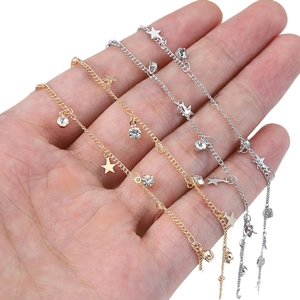 Minimalist gold and silver star charm chain bracelet with sparkling rhinestones set