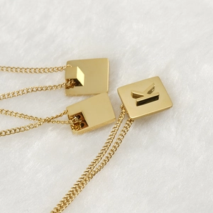 18K gold plated titanium steel necklace featuring a square pendant with letter K detail