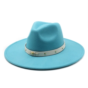 Detail of blue wool felt fedora with white leather band and gold stud embellishments