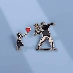Gothic cartoon Banksy style enamel pins set featuring girl with red balloon and flower thrower