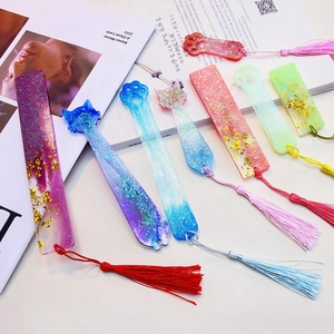 Handmade resin bookmarks in cat paw and rectangle shapes with colorful silk tassels