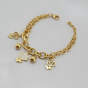 Gold stainless steel bracelet with hollow rose charms and sparkling crystal details