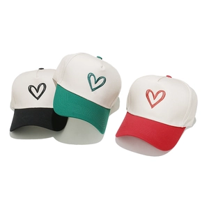 Contrast panel baseball caps with heart embroidery in black, green, and red colors