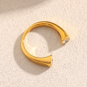Minimalist 18K gold plated stainless steel open ring featuring two square cubic zirconia