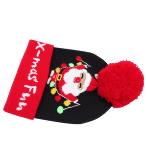 Detail of Christmas knit hat featuring LED Santa design and X-mas Fun text on red cuff