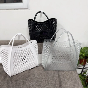 Detailed view of hollow out woven jelly bags in white black and transparent PVC