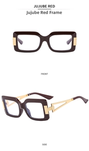 Detail view of jujube red frame glasses with golden hollow metal temple decoration