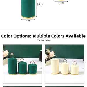 Microfiber cylinder ring display stands in green and beige with gold metal base