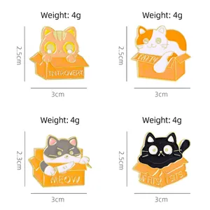 Set of four cute cartoon cat enamel pins in boxes with funny introvert quotes