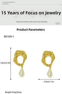 Detailed view of vintage baroque pearl long earrings with gold irregular hammer texture