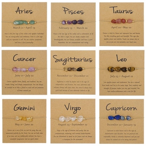 Collection of 9 handmade zodiac bracelets with natural stones on kraft cards