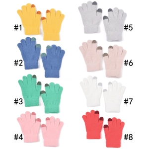 Eight pairs of colorful winter knitted gloves with touchscreen tips for children and adults