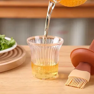 Heat resistant glass oil dispenser bottle with silicone brush and ribbed texture design