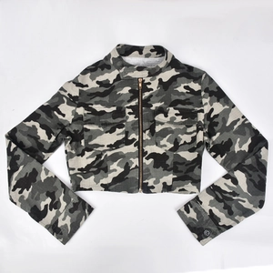 Detailed close-up of camouflage jacket featuring chest flap pockets and metal zipper