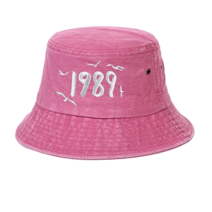 Detailed embroidery of 1989 and seagulls on a pink washed cotton baseball cap