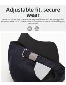 Detail of adjustable metal buckle on dark blue cotton baseball cap for secure fit
