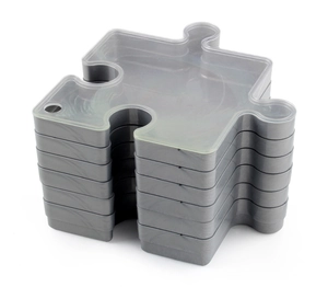 Stackable puzzle-shaped sorting trays with a clear lid for organizing jigsaw pieces