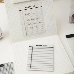 Translucent PET sticky notes with Record Life print on a grid notebook background