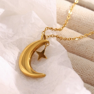 18K gold plated stainless steel necklace featuring crescent moon and star charms