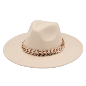 Detail of beige fedora hat featuring a chunky gold acrylic chain on a wool felt brim
