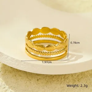Detail view of 18K gold multilayer ring with precise measurements and weight specs
