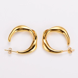 Elegant gold twisted C-shaped pea pod hoop earrings with smooth metallic texture