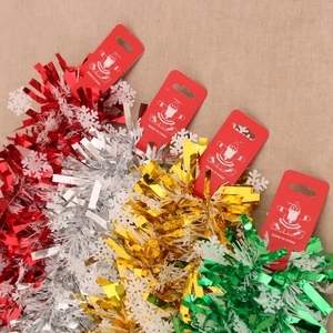 Christmas tinsel garland set in red, gold, silver, and green with white snowflake accents