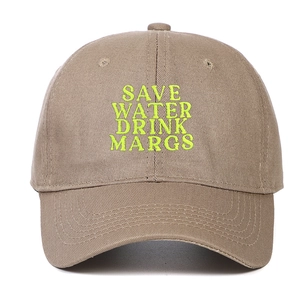 Close-up of Save Water Drink Margs neon green embroidery on khaki cotton baseball cap