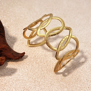 French style gold plated titanium steel open cuff bracelet with hammered leaf texture