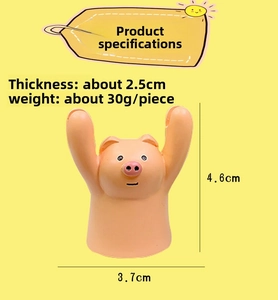 Detailed dimensions of a cute orange pig desk ornament against a yellow background