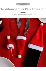 Miniature red velvet Santa hats set used as cutlery holders and lollipop decorations