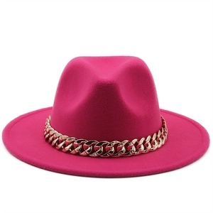 Detailed view of rose red wide brim wool felt fedora hat with gold chain decoration