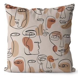 Detail of cream cushion cover featuring black abstract face lines and earth tone shapes