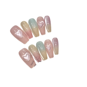Handmade gradient cat eye press-on nails in long coffin shape with 3D relief hearts