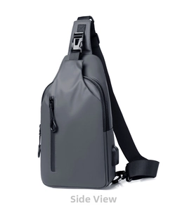 Detailed view of grey men's sling bag with USB port, waterproof fabric and adjustable strap.