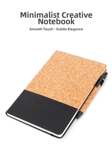 Detail of A5 notebook set with cork and black fabric texture and matching ballpoint pen