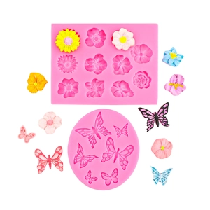 Pink silicone mold set featuring flower and butterfly shapes for fondant cake decorating