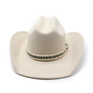 Detailed view of cream felt cowboy hat featuring a black and white checkerboard ribbon