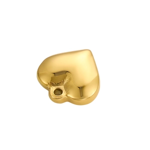 Polished 18k gold heart pendant detail with smooth mirror finish and hanging hole
