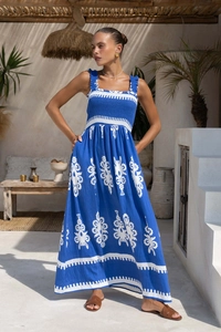 Detailed view of the blue floral vacation maxi dress with smocked bodice and fine texture