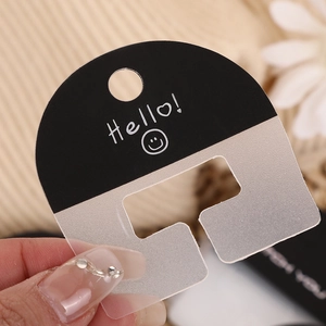 Frosted black jewelry display card with Hello text and hanging hole for hair clips