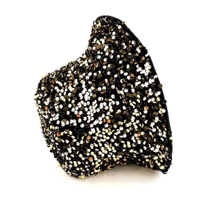 Close-up of dual-color gold and champagne sequins on a trendy leopard pattern bucket hat