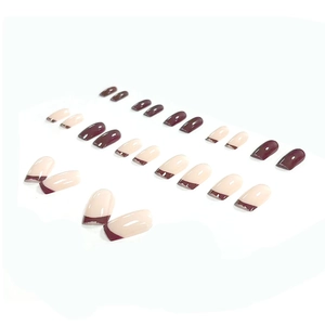 Glossy burgundy gradient French tip press-on nails set with elegant nude pink base