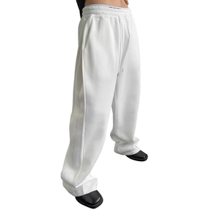 Classic white wide-leg joggers with elastic drawstring waist and premium fleece lining