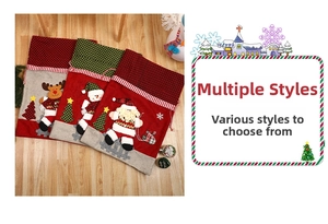 Detailed view of three 3D Christmas drawstring gift bags with Santa, Snowman, and Reindeer
