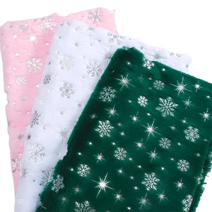 Plush Christmas fabric with silver snowflake patterns in pink, white and dark green colors