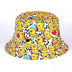 Detail showing cartoon duck print and fine stitching on cotton bucket hat fabric