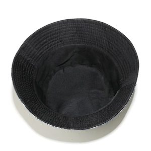 Detail view of the black bucket hat interior showing reinforced stitching and fabric lining